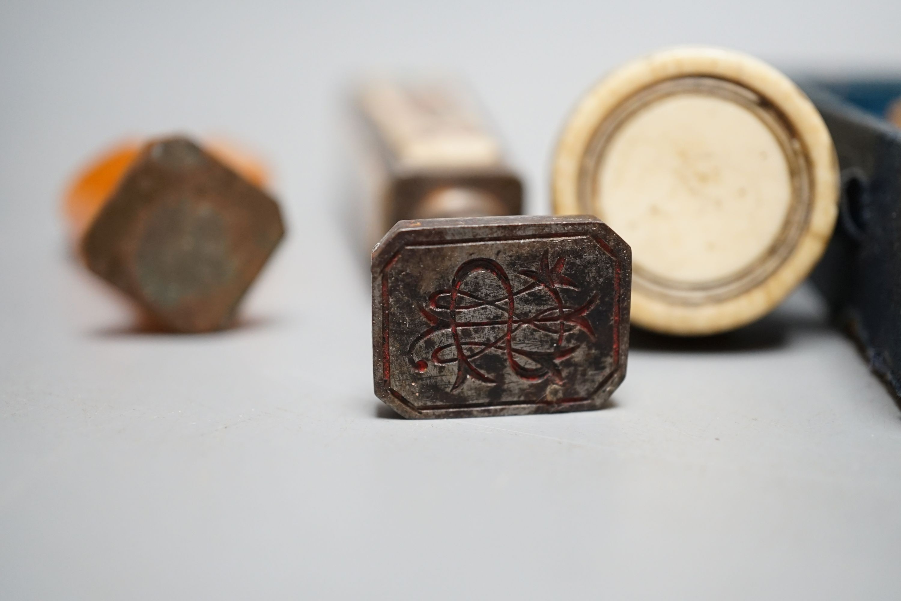 A group of seals including two boxed Chinese soapstone seals